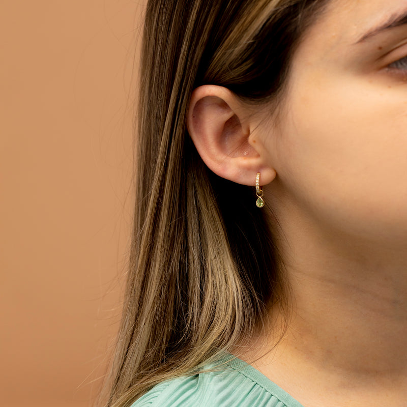 minimalistic design earring charm and huggy