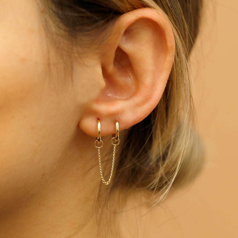 Model wears Dangly Cuban Chain Earring Charm in 14k solid gold gift for her