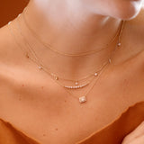 minimalist stacking necklaces with diamonds