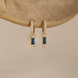 prong set sapphire charms