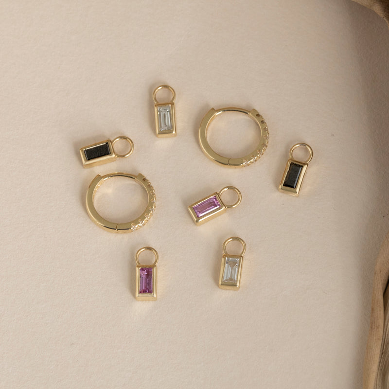 diamond, black diamond, pink sapphire charms in 14k gold