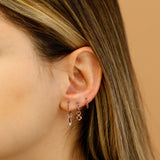 july birthstone ruby earring stack hoop huggies in 14k solid gold