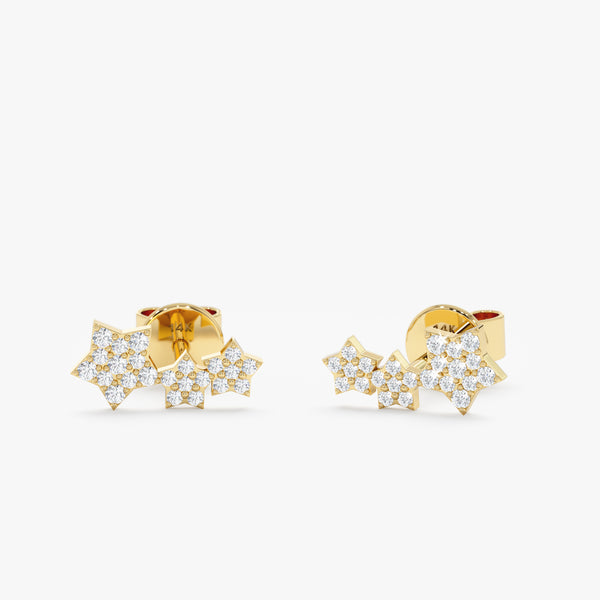 handmade pair of solid 14k solid gold triple star diamond paved stud earrings