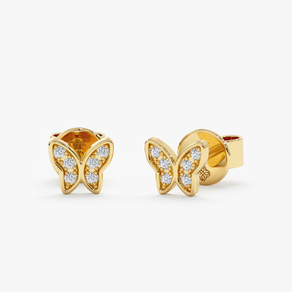 handmade pair of solid 14k gold butterfly stud earrings with diamonds