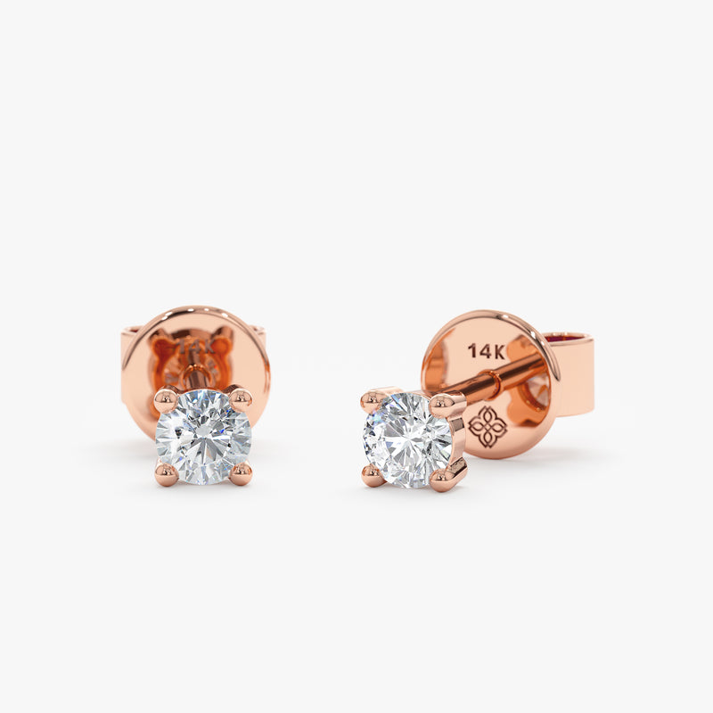 Pair of 14k solid rose gold 4 prong set natural diamond