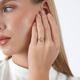 Close-up of a woman wearing a Marquise Diamond Split Shank Engagement Ring, showcasing its elegant design.