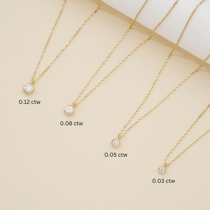 Single diamond bezel necklace in 4 different sizes