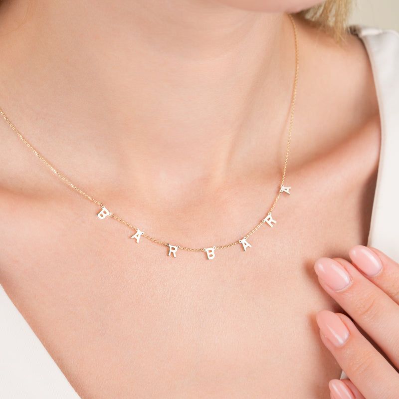 minimalistic gold name letter charms necklace