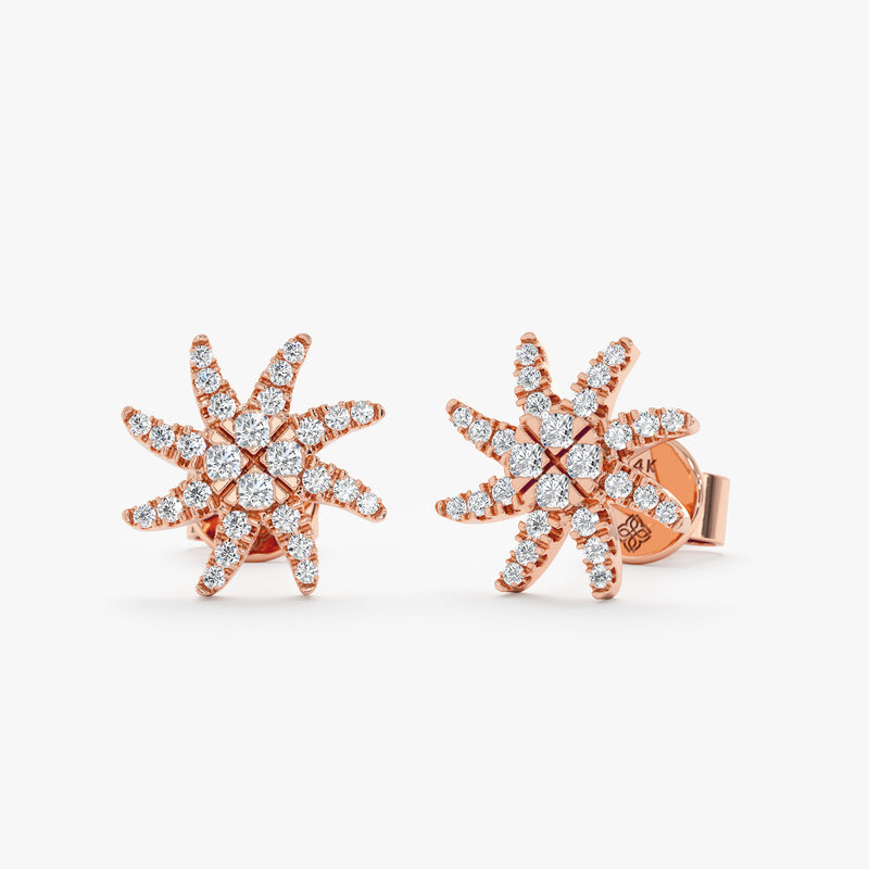Delicate sunburst shaped solid 14k rose gold stud earrings handmade in diamonds.