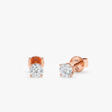 Dainty Natural diamond studs in solid 14k rose gold.