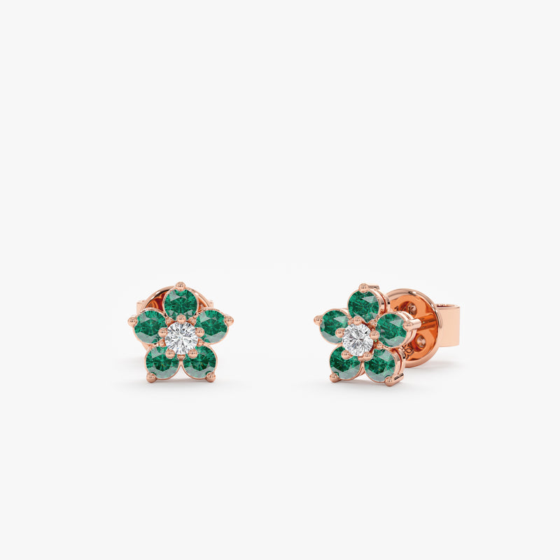 Elegant handcrafted flower shape earring stud with emeralds and natural diamond in 14k solid rose gold. 