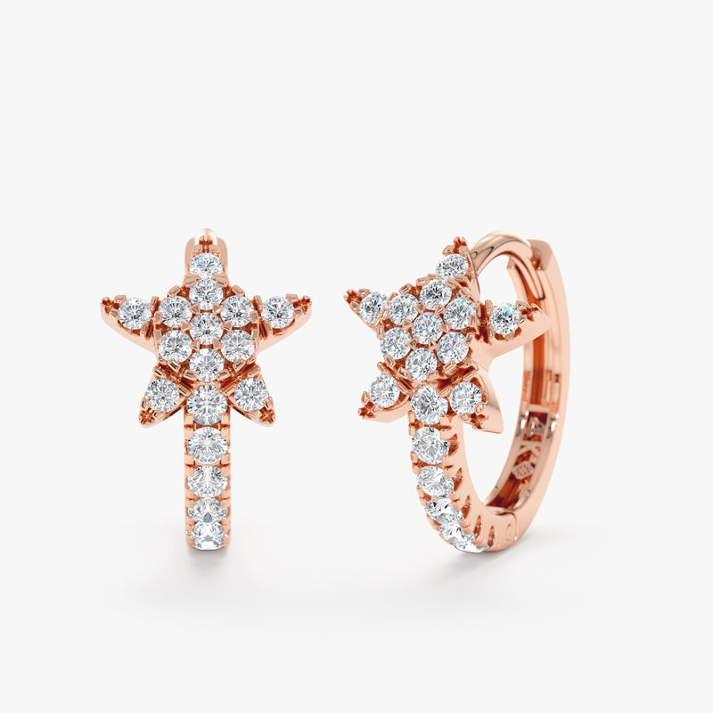 Delicate gold huggie earrings sparkle with pave diamonds, forming a charming star shape