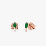 Delicate marquise emerald stone and April birthstone natural diamond earring stud in 14k rose gold. 