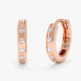 Handmade pair of ethically sourced solid 14k rose gold huggie earrings