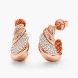 Pair of thick vintage inspired 14k solid rose gold ear huggies with lined ethically sourced diamonds. 