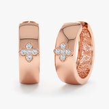 Product image for thick minimalistic clover natural diamond huggies in solid 14k rose gold.