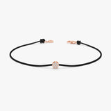 black string bracelet with diamond paved disc in rose gold