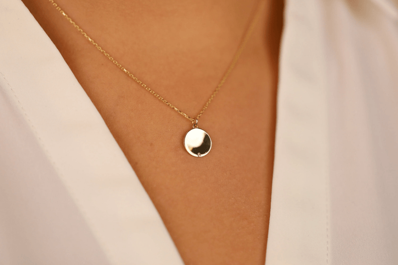 engravable disc pendant with single diamond