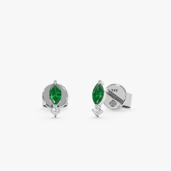 Handcrafted 14k white gold earring studs with marquise emerald May birthstone and natural diamond. 