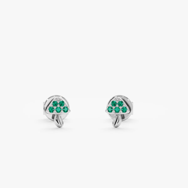 Handcrafted 14k solid white gold mushroom studs with green emeralds. 