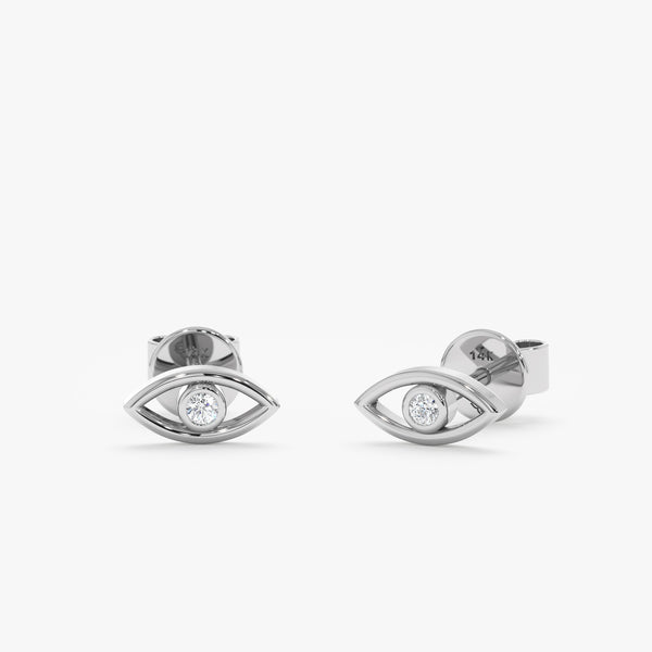 handmade pair of solid white gold eye stud earrings with single diamond