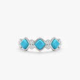 Cymbria Discover effortless sophistication with our Natural Turquoise & Lab Grown Diamond Ring. Crafted in lustrous solid gold, this exquisite band features a captivating arrangement of vibrant square natural turquoise cabochons, each meticulously bezel-s