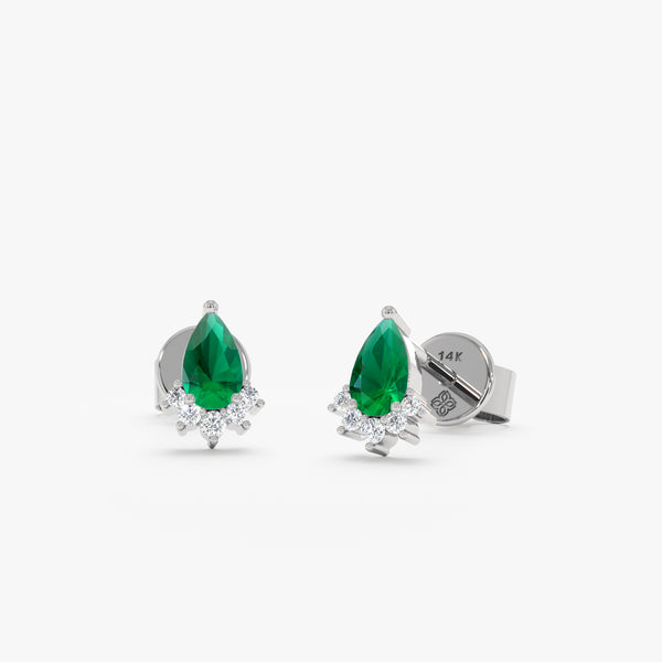 Delicate pear-cut emerald and diamond studs in 14k/18k white gold. A thoughtful gift for women.