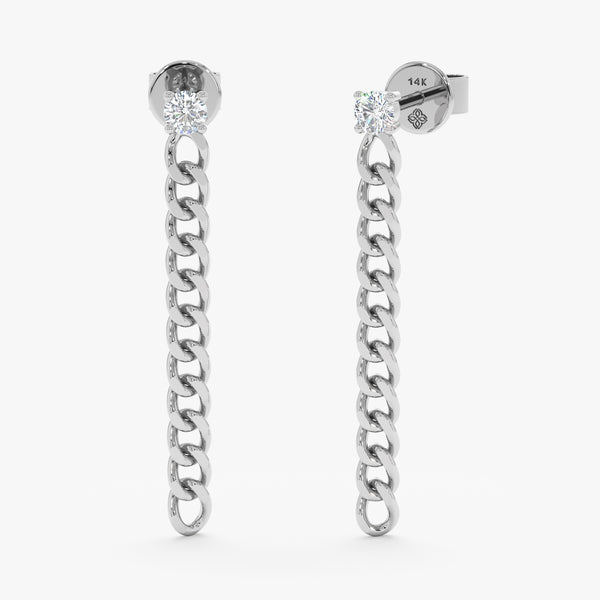 Pair of 14k white gold solitaire diamond stud earrings with hanging cuban chain 
