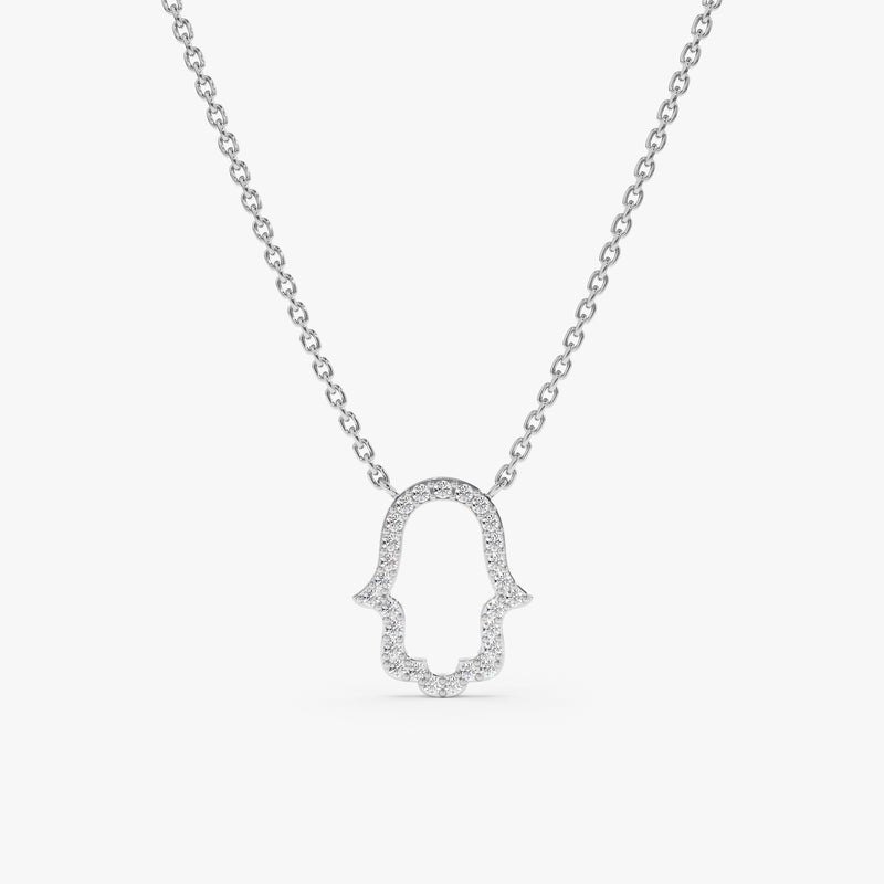 solid white gold necklace with hamsa hand pendant with lined diamonds