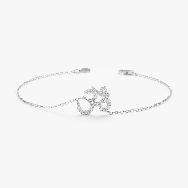 Diamond OM symbol bracelet on a white gold chain