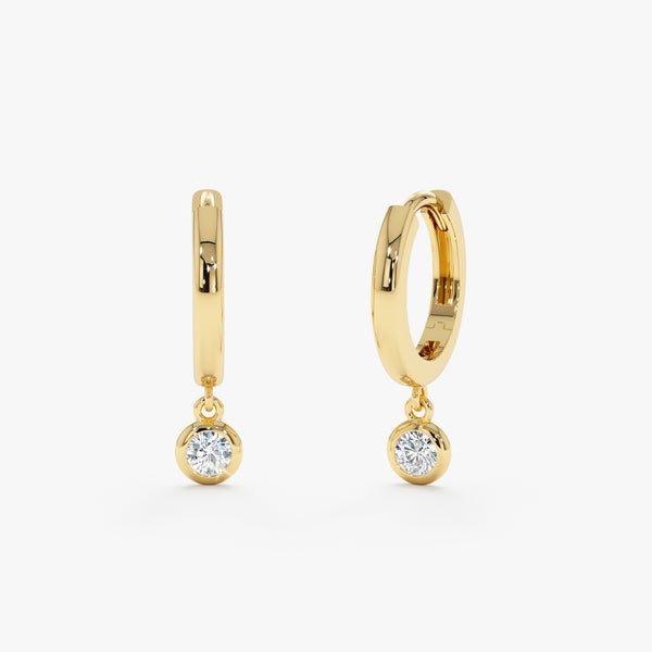 Pair of solitaire diamond charm huggies in 14k solid gold