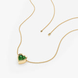 petite green gem heart in solid gold