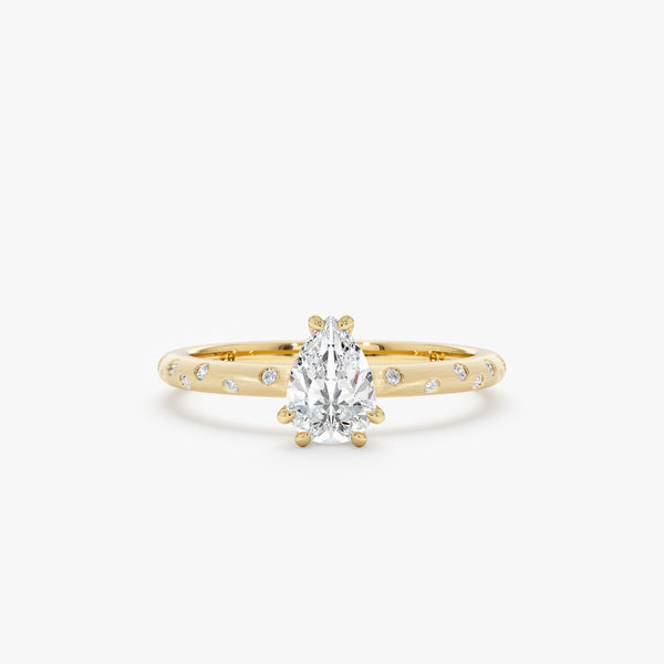 yellow gold pear diamond engagement band