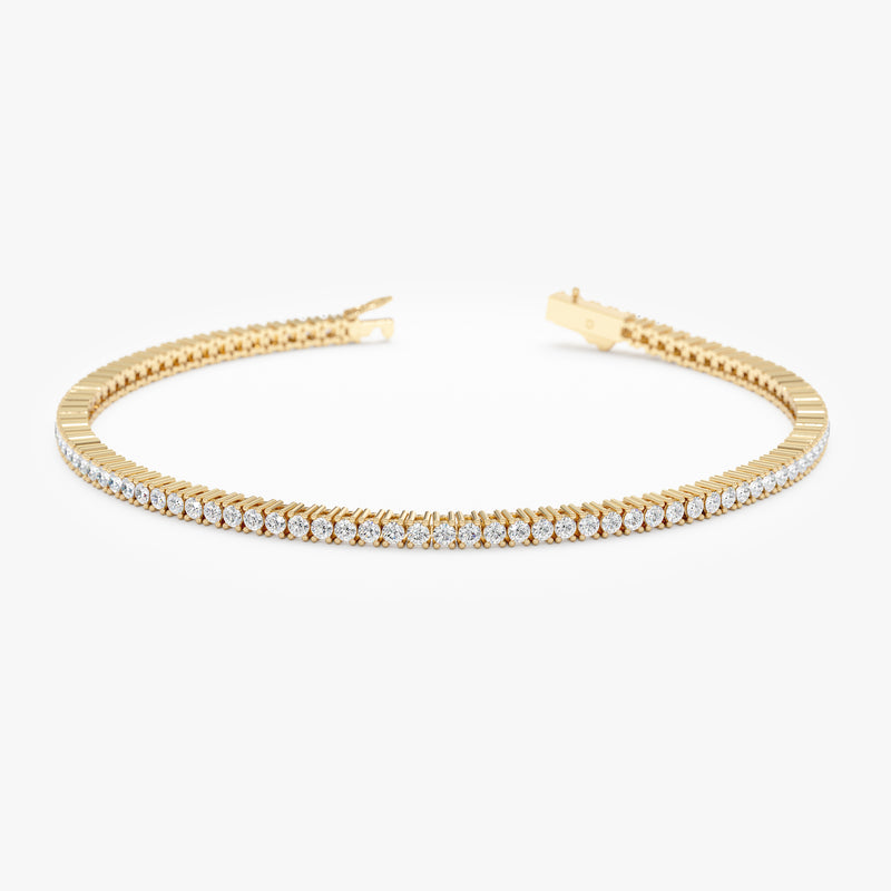Diamond eternity bracelet crafted in solid gold.