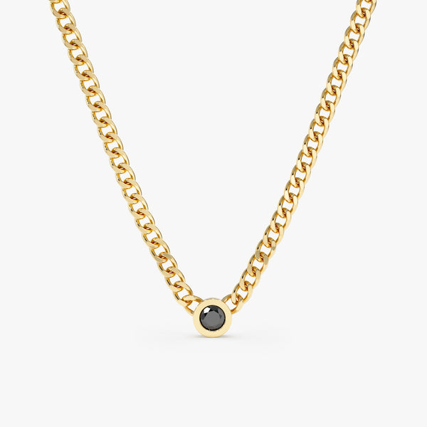 yellow gold cuban chain necklace with single bezel black diamond