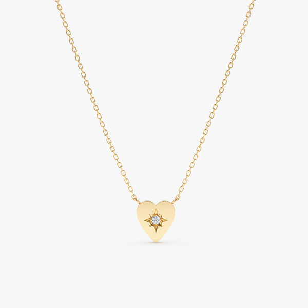 handmade solid gold necklace with starburst heart pendant with single diamond 