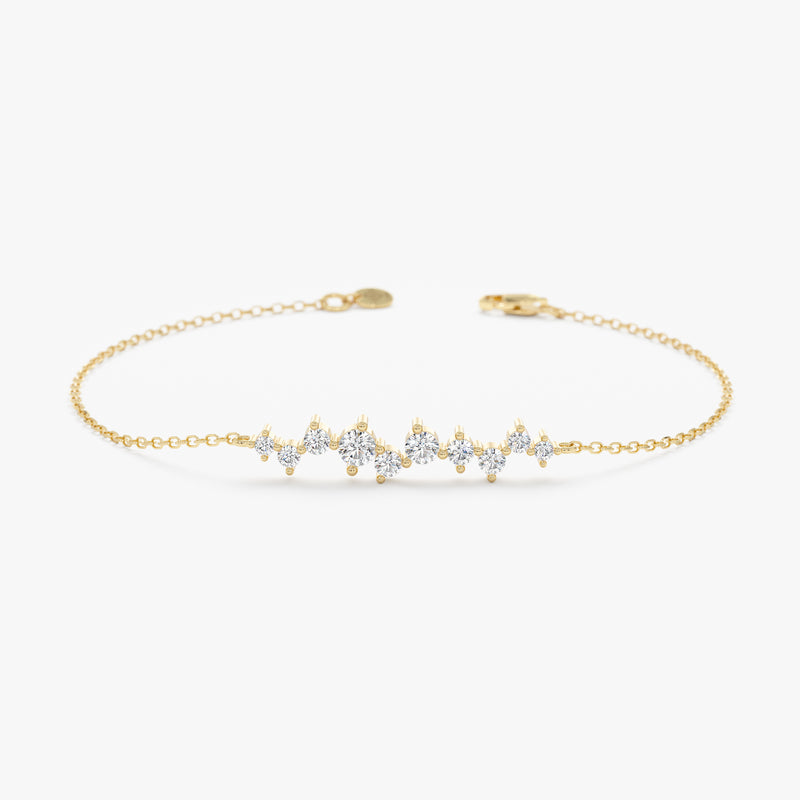 Diamond cluster bracelet in solid gold.