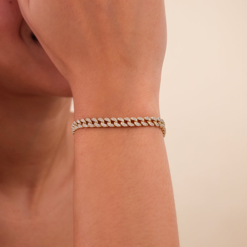 Make a statement with this solid gold diamond Cuban chain bracelet.