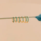 Handcrafted 14k solid gold emerald lined hoop huggies 