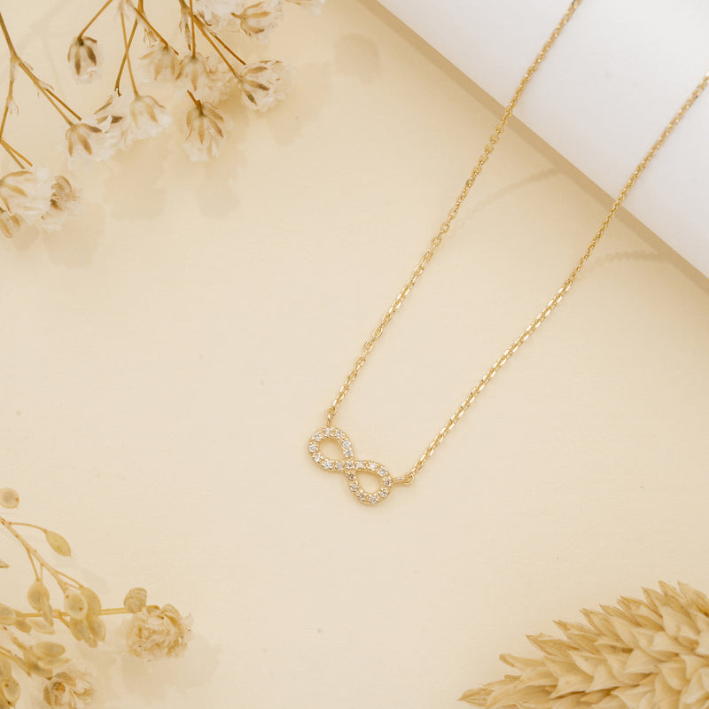 Minimalistic Gold and Diamond Infinity Necklace