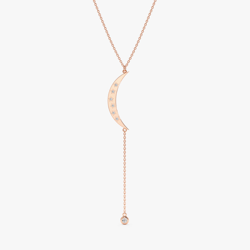 rose gold moon pendant with single bezel diamond