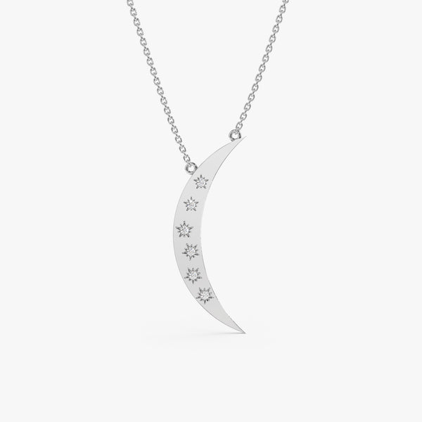 white gold moon necklace with starburst natural diamondsetting