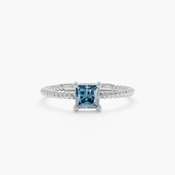 White Gold Prong Set Blue Topaz Ring