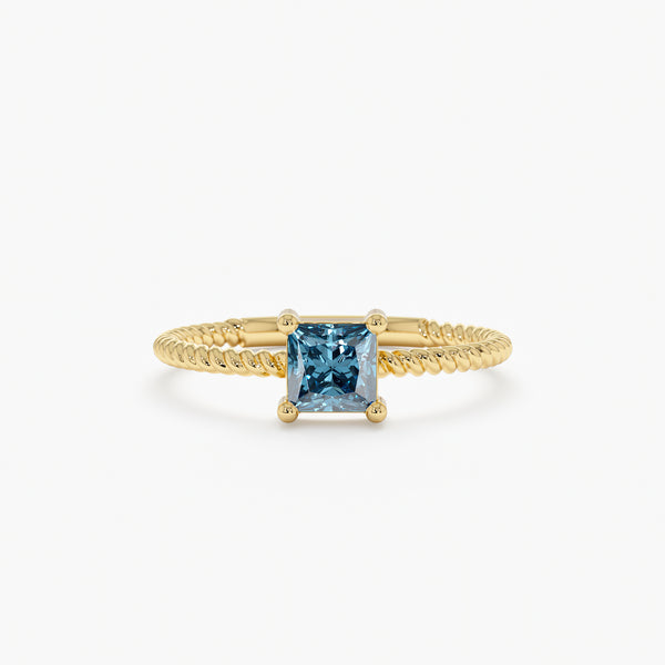 Prong Set Blue Topaz Ring