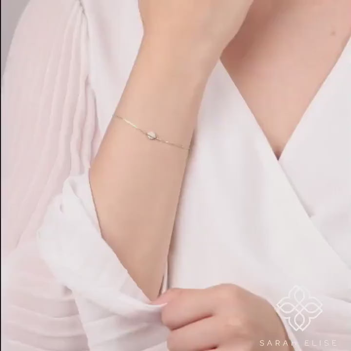petite handmade saturn bracelet