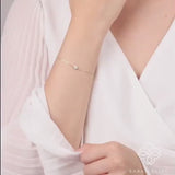petite handmade saturn bracelet