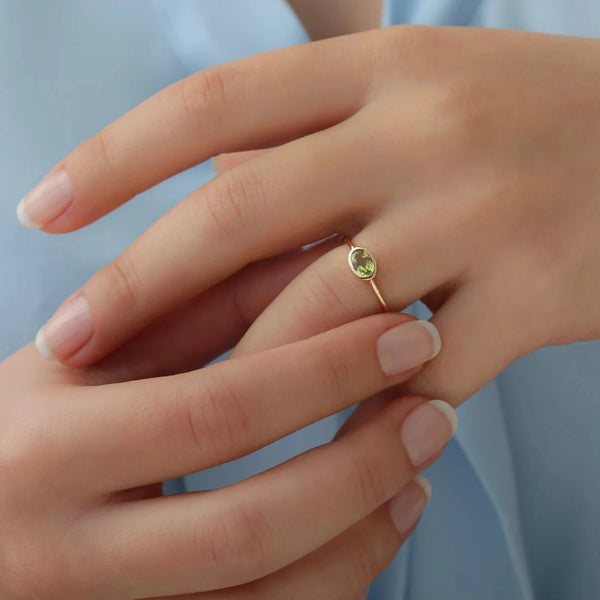 august birthstone peridot ring