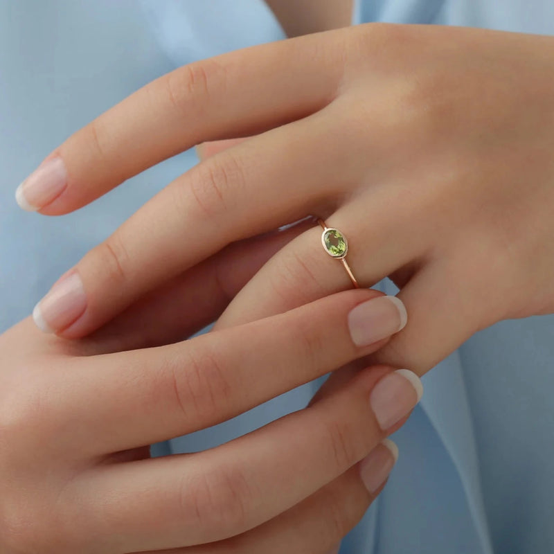 august birthstone peridot ring
