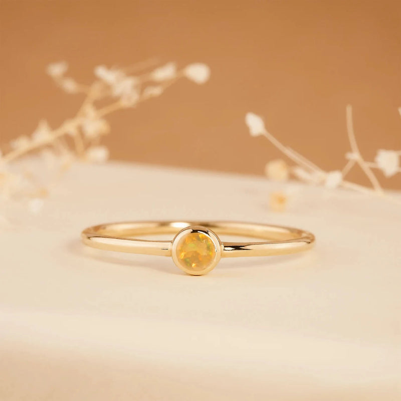 solid gold round cut opal