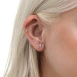 minimalistic style diamond lightning bolt stud